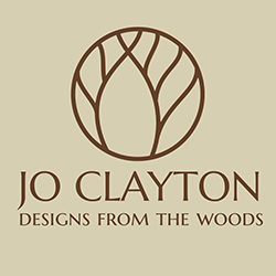 Jo Clayton Designs from the woods logo